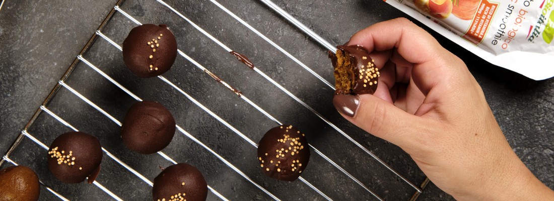 Pumpkin balls and peanut cream covered with dark chocolate